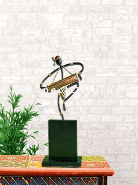 Buy Musician Carrying Dholak Figurine in Wrought Iron, 11x4x3 in At u602075863_New_db.com